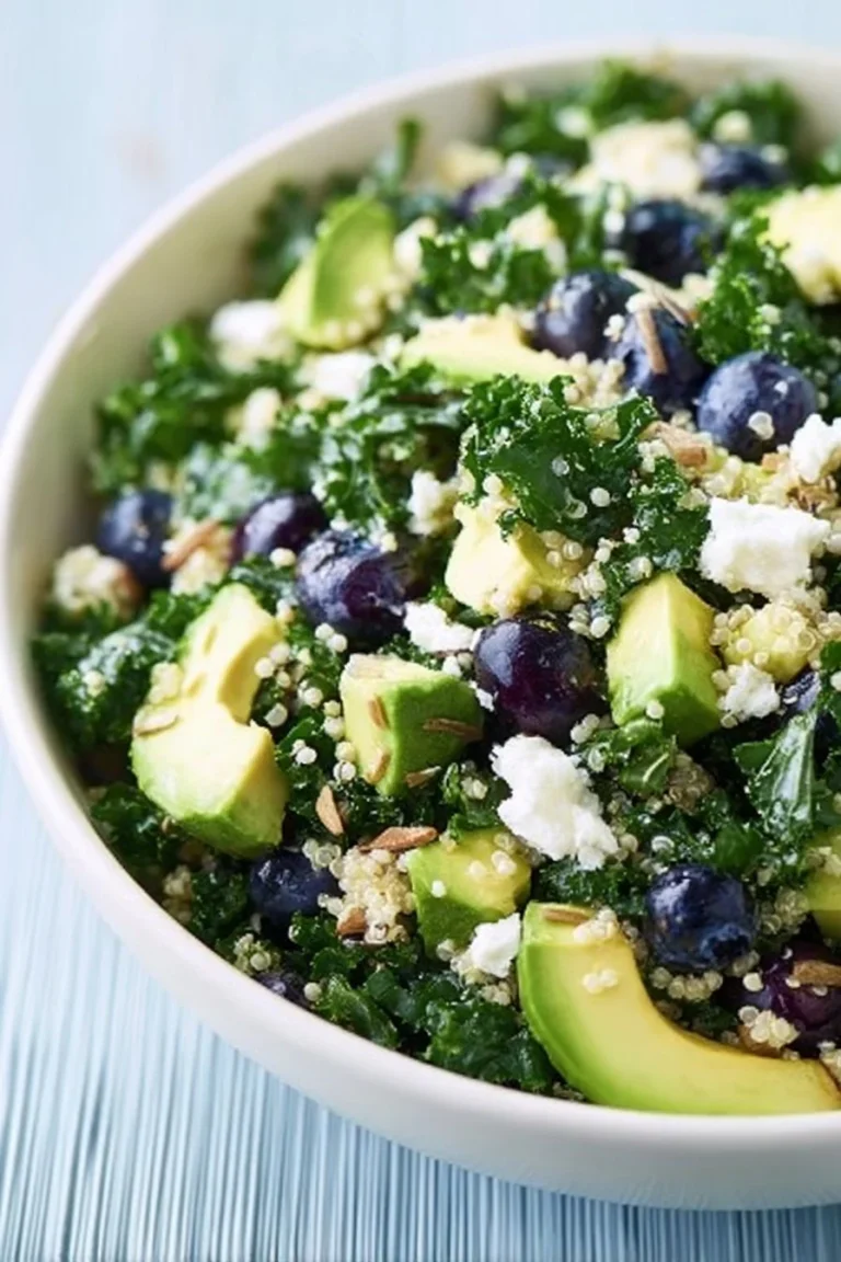 Kale Superfood Salad with Quinoa and Blueberries in a bowl