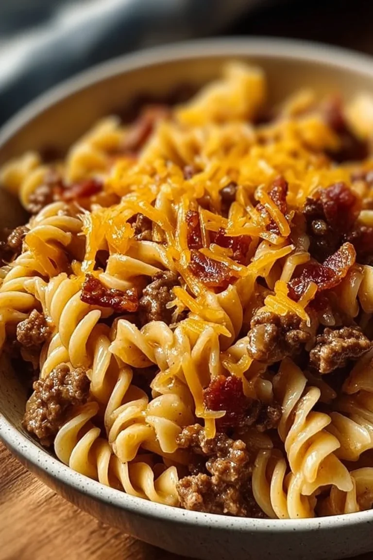 Loaded Bacon Cheeseburger Pasta in a bowl topped with bacon and cheese
