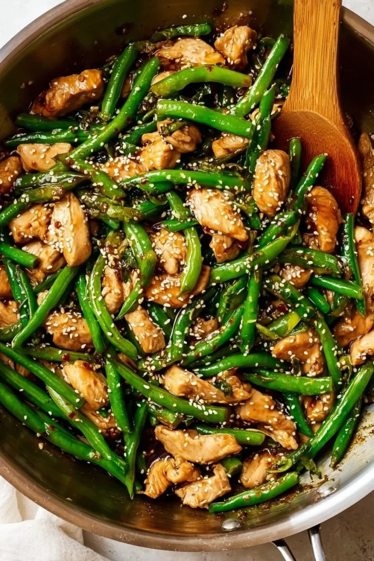 Plate of Keto Teriyaki Chicken garnished with sesame seeds and green onions