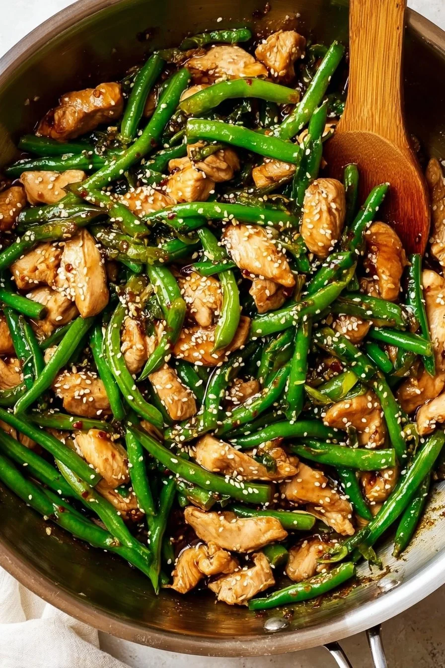 Plate of Keto Teriyaki Chicken garnished with sesame seeds and green onions