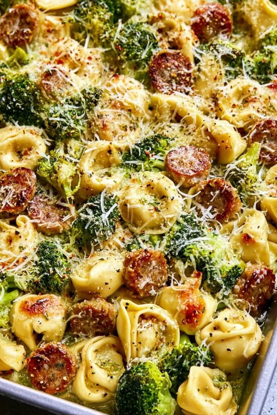 Sheet pan broccoli tortellini bake with cheese and fresh vegetables